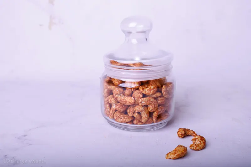 Acharya Sweet House Masala Cashew in a glass jar